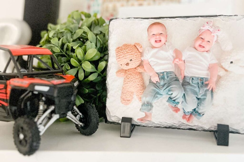 A picture of our twins printed a flat rock that we gave to dad for his first fathers day.