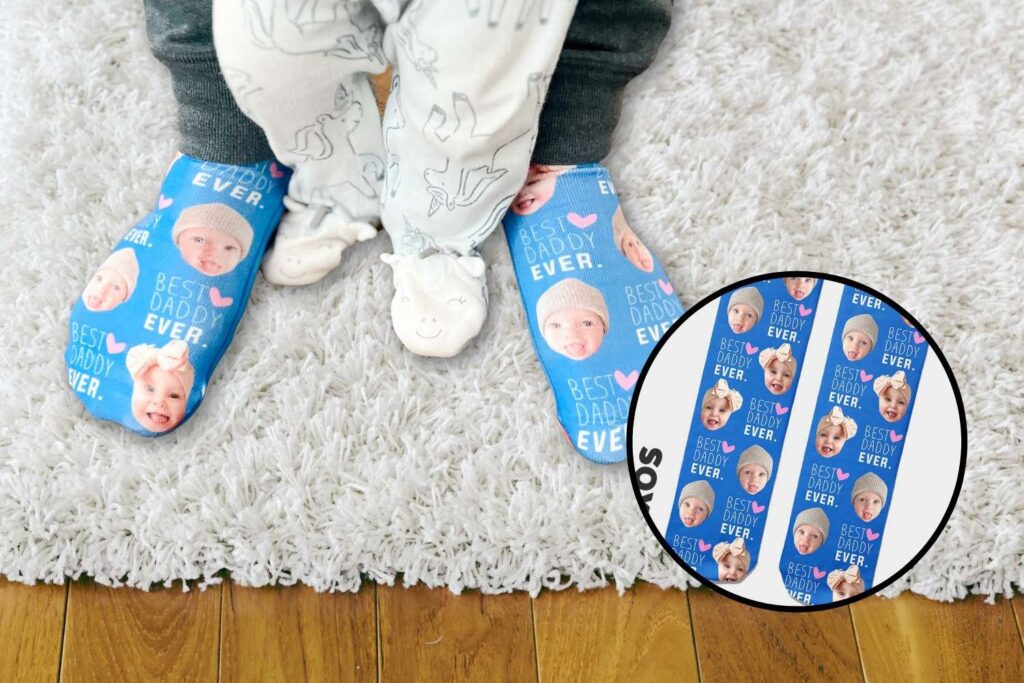 Dad wearing his custom face socks with pictures of the twins' heads on them that he received as a gift on his first fathers day. 