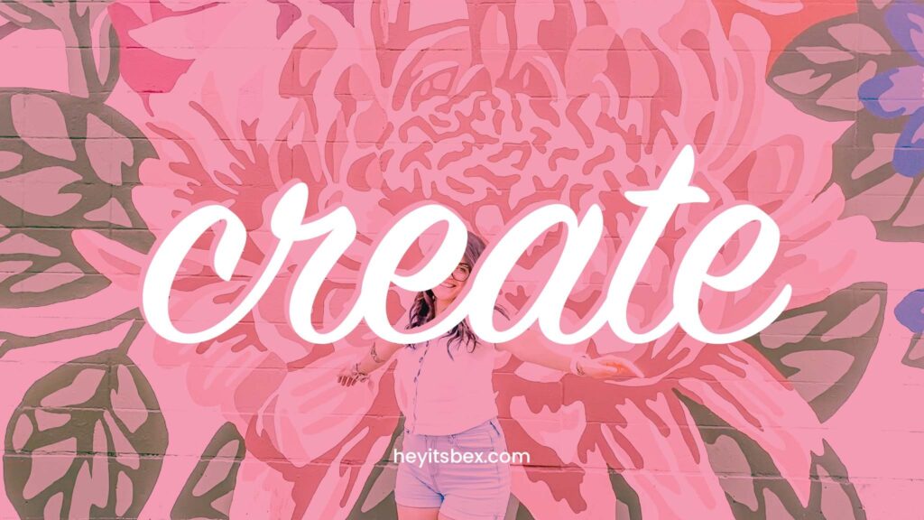 A picture of bex in front of a flower mural overlayed with a pink fill, and the word 'create', our yearly theme word, written in white text.